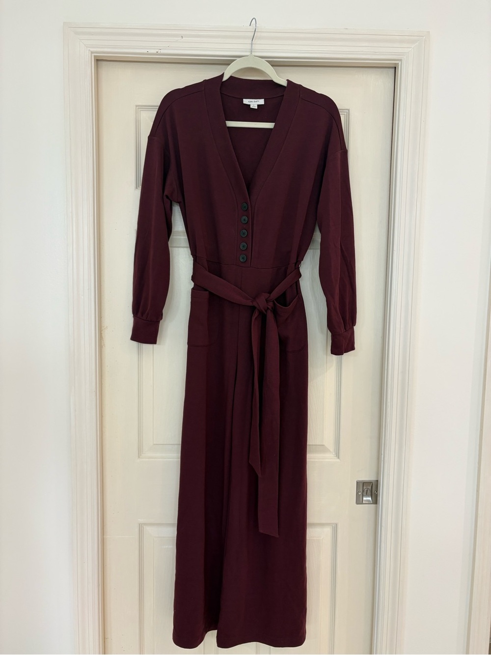 Women's Long Sleeve Belted V-Neck Jumpsuit in Burgundy
